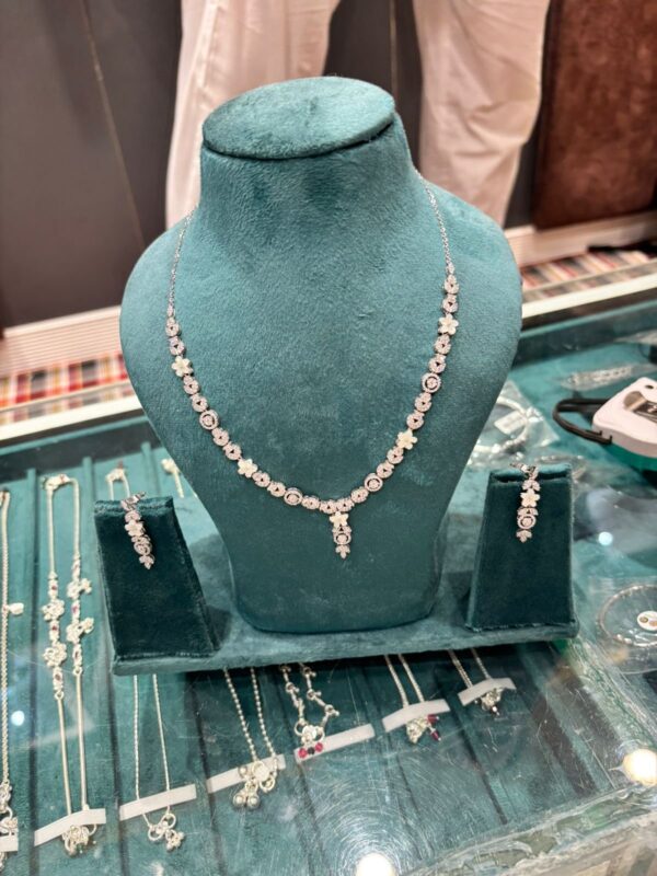 Light weight silver necklace with matching earrings